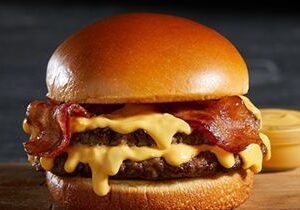 Nathan’s Famous Launches New Bacon Cheddar Cheesy Burger in Celebration of National Cheeseburger Day