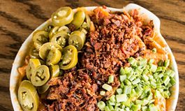 Indulge in National Cheddar Fries Day at Snuffer’s