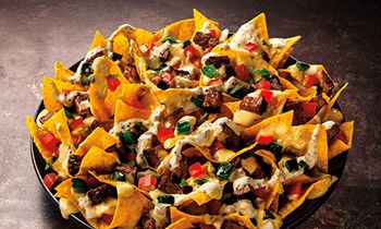 Taco John’s Adds Sirloin Steak Nachos To Signature Menu