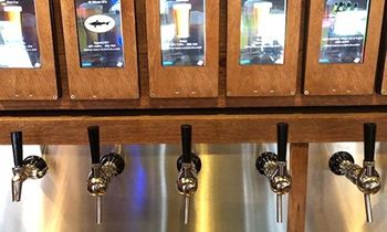 Crave Hot Dogs and BBQ Features Self-Serve Beer Wall!