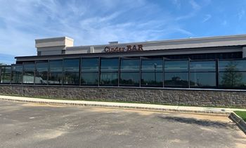 Cinder Bar’s Roll-A-Cover Retractable Patio Enclosure Opening Soon