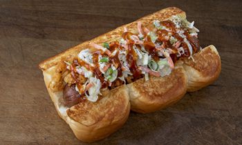 Dog Haus’ Chef Collaboration Series Returns With Michelin-Starred Chefs