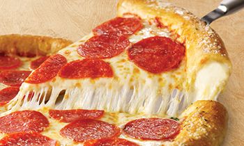 Pizza Inn’s Triple Cheezy Stuffed Crust is Back for Delivery and Carryout