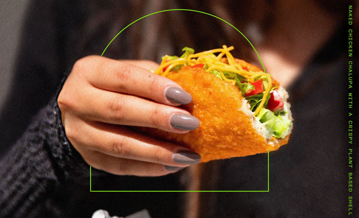 Taco Bell Tests A Naked Chalupa With A Crispy Plant-Based Shell That's More Than Meats The Eye