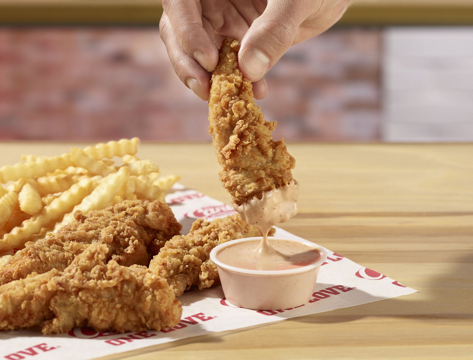 Raising Cane's to Give Away Free Cane's Sauce for Month of December