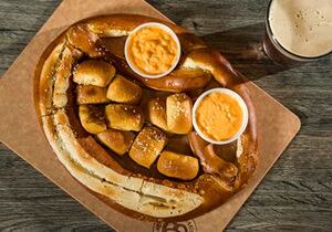 Crave Hot Dogs and BBQ Enters Indiana