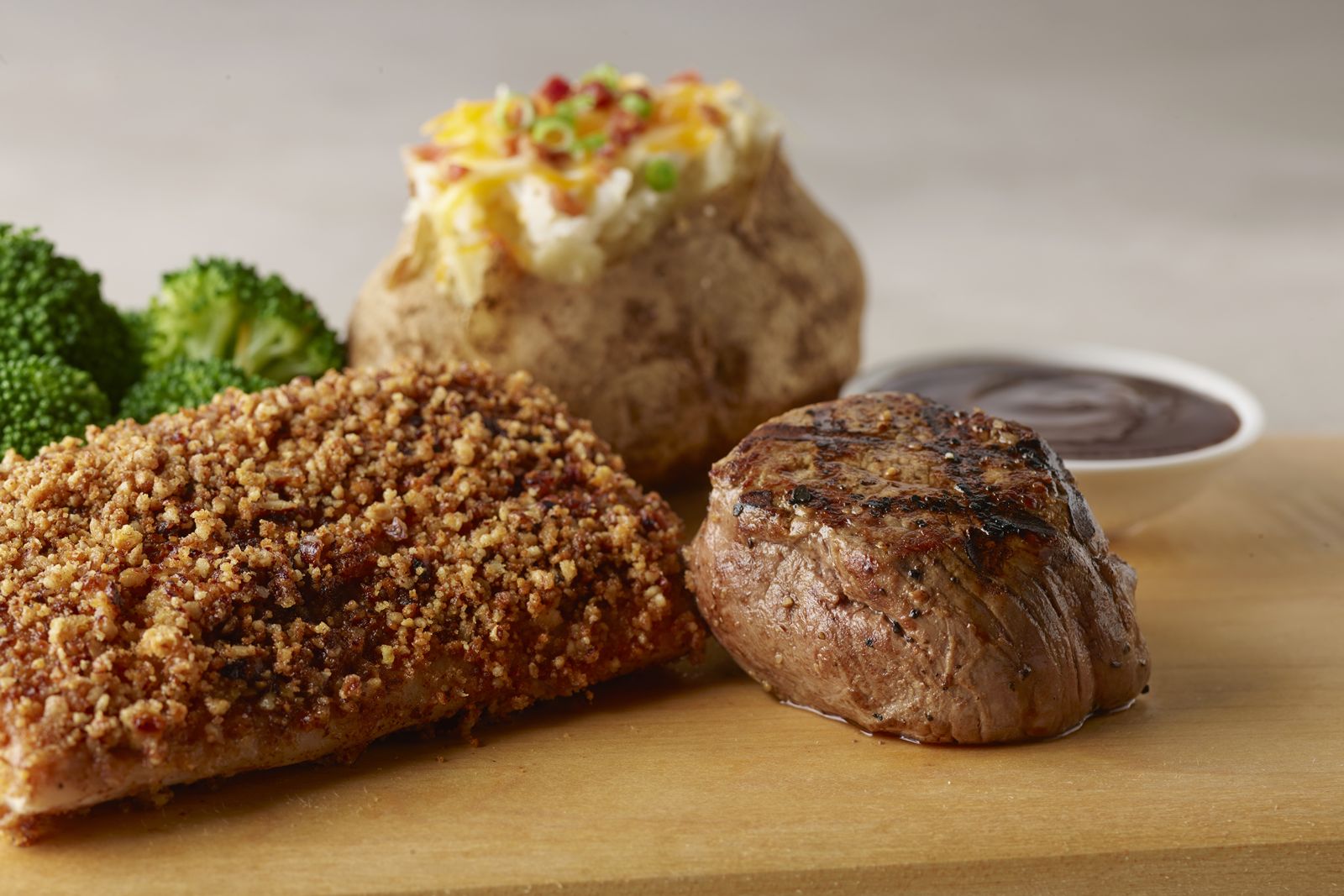 Smokey Bones Pecan Crusted Mahi + Filet Medallion Smokey Bones Adds New Meat from the Deep (Blue Sea)
