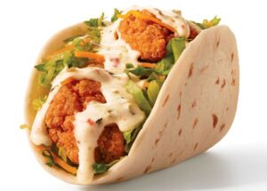 Taco John’s Gets Even Cheesier with Queso Fried Chicken Tacos