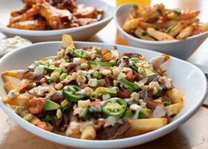 Wings and Rings Introduces New Crave-Worthy Loaded Fries for Spring