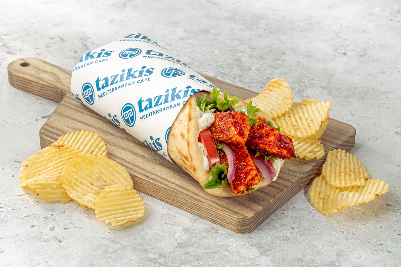 Taziki's Spicy Harissa Chicken Gyro Taziki's Is Upping Its Game with New Flavors and Menu