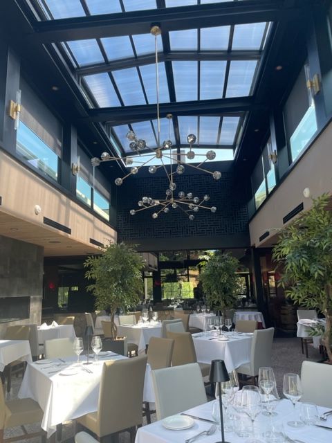 Rraci's New Outdoor Dining Space Equipped with a Roll-A-Cover Motorized Roof
