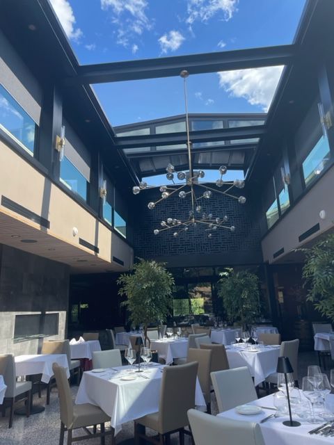 Rraci's New Outdoor Dining Space Equipped with a Roll-A-Cover Motorized Roof