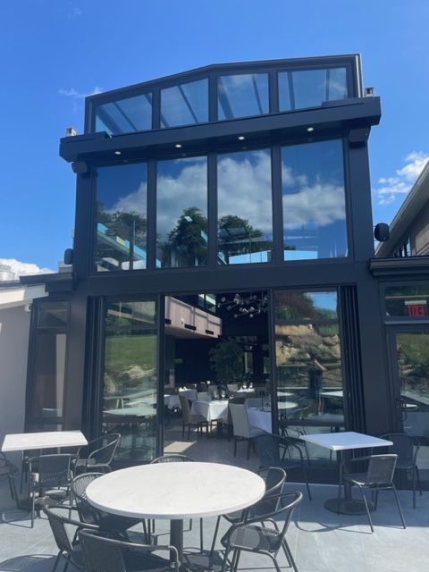 Rraci's New Outdoor Dining Space Equipped with a Roll-A-Cover Motorized Roof