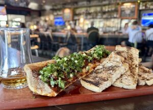 Whiskey Cake Kitchen & Bar Drops Bold New Social Hour With A Epic Bone Marrow Booze Luge