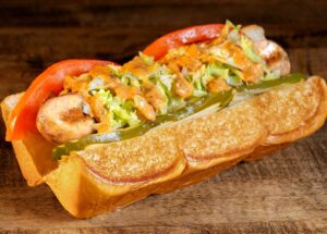 Dog Haus’ Bacon Cheeseburger Sausage And Strawberry Sour Cocktail Make The Holidays Merry And Bright