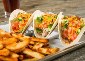 Crave Hot Dogs & BBQ Triumphs in 2023: A Year of Awards and Recognition