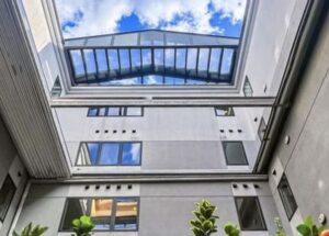 Publico Boston Features Roll-A-Cover Motorized Retractable Roof