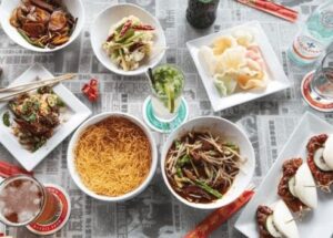 HX Brands Serves up New Venture, Dragon Alley, in MidCity District