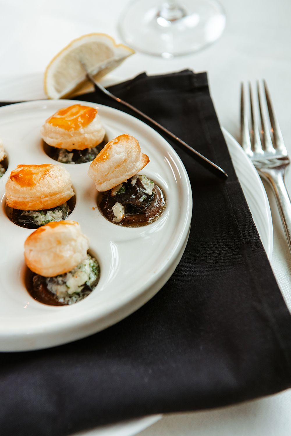 Eddie Merlot's Unveils Sophisticated Summertime Menu with Fresh Off The Grill Features Eddie Merlot's Escargot Bourguignonne