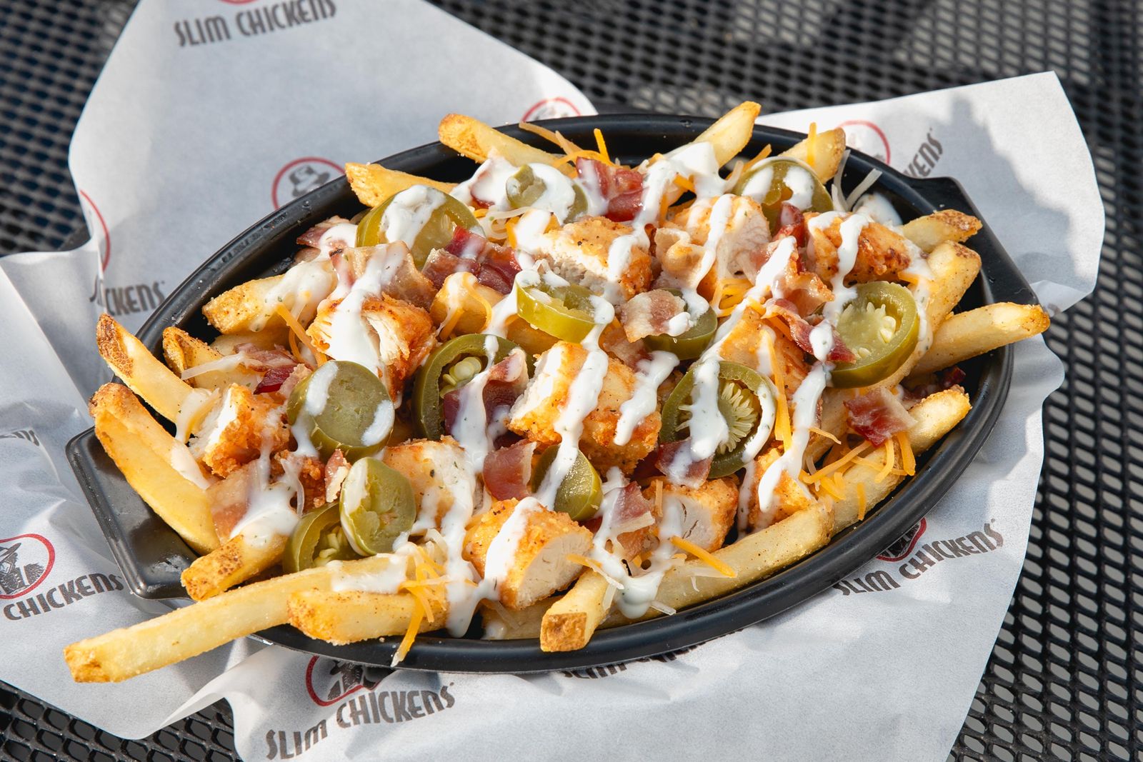 Slim Chickens Launches New Loaded Fries Limited-Time Offer Slim Chickens Launches New Loaded Fries Limited-Time Offer