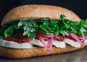 Sessions West Coast Deli Celebrates a Decade of Radical Eats with 10-Year Anniversary Specials & Surf Film Debut