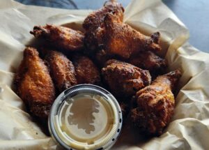 Water Pig BBQ’s Convenient Family-Style To-Go Meals Save Guests Time and Money When They’re Feeding a Crowd in Pensacola Beach