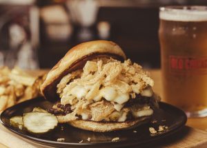 Old Chicago Pizza + Taproom Marks 50 Years with Cinco Cero Tour, New Burger and Milestone Rewards