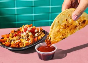 Taco Bell’s Shredded Beef Dipping Taco Returns, Ready To Deliver the Ultimate Saucy Experience