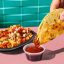 Taco Bell’s Shredded Beef Dipping Taco Returns, Ready To Deliver the Ultimate Saucy Experience