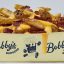 July Restaurant Deals for French Fry Day, Hot Dog Day, Chicken Wing Day, and More!
