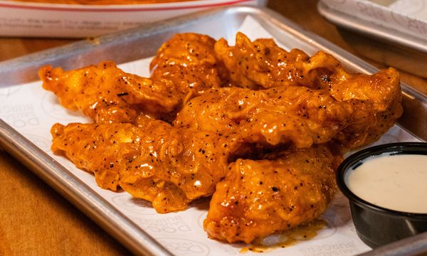 Fantasy Football Draft Season - Dog Haus August Restaurant Deals for Back to School, Beer Day, Filet Mignon Day, and More!