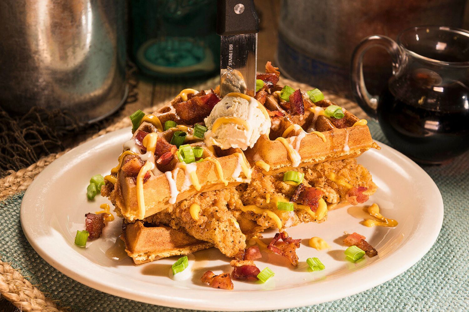 Huckleberry's Breakfast & Lunch Stacked Chicken and Waffles Huckleberry's Breakfast & Lunch Spicy Bayou Chicken Sandwich