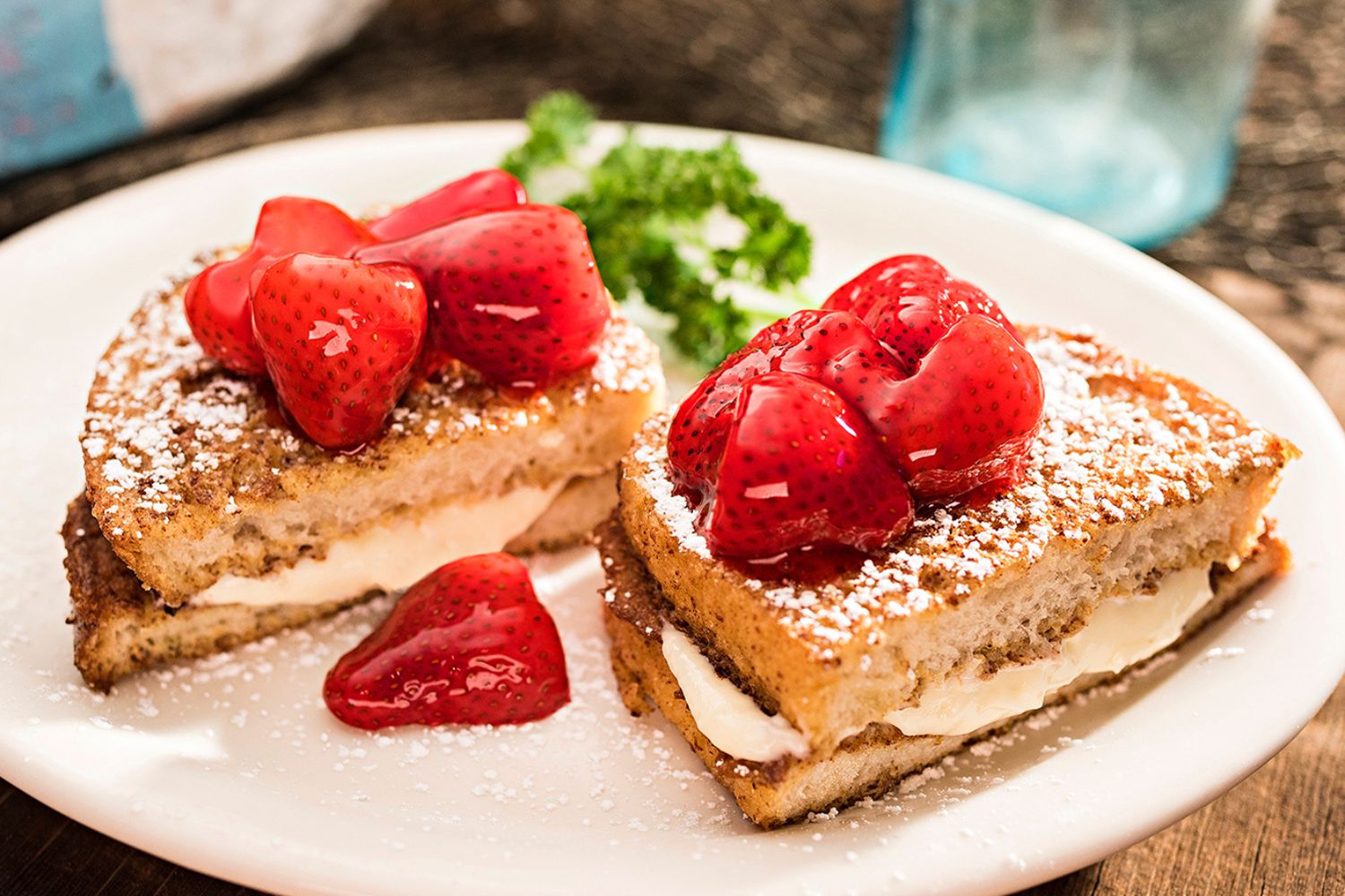 Huckleberry's Breakfast & Lunch Strawberry Stuffed French Toast Huckleberry's Breakfast & Lunch Spicy Bayou Chicken Sandwich