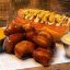 Dog Haus Serves Up Oktoberfestival With the Prost Platter and Stein-Holding Contests