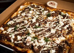 The Freak Hits Miami: Chèvre and Prince St. Pizza Team Up for a New Greek-Inspired Pie